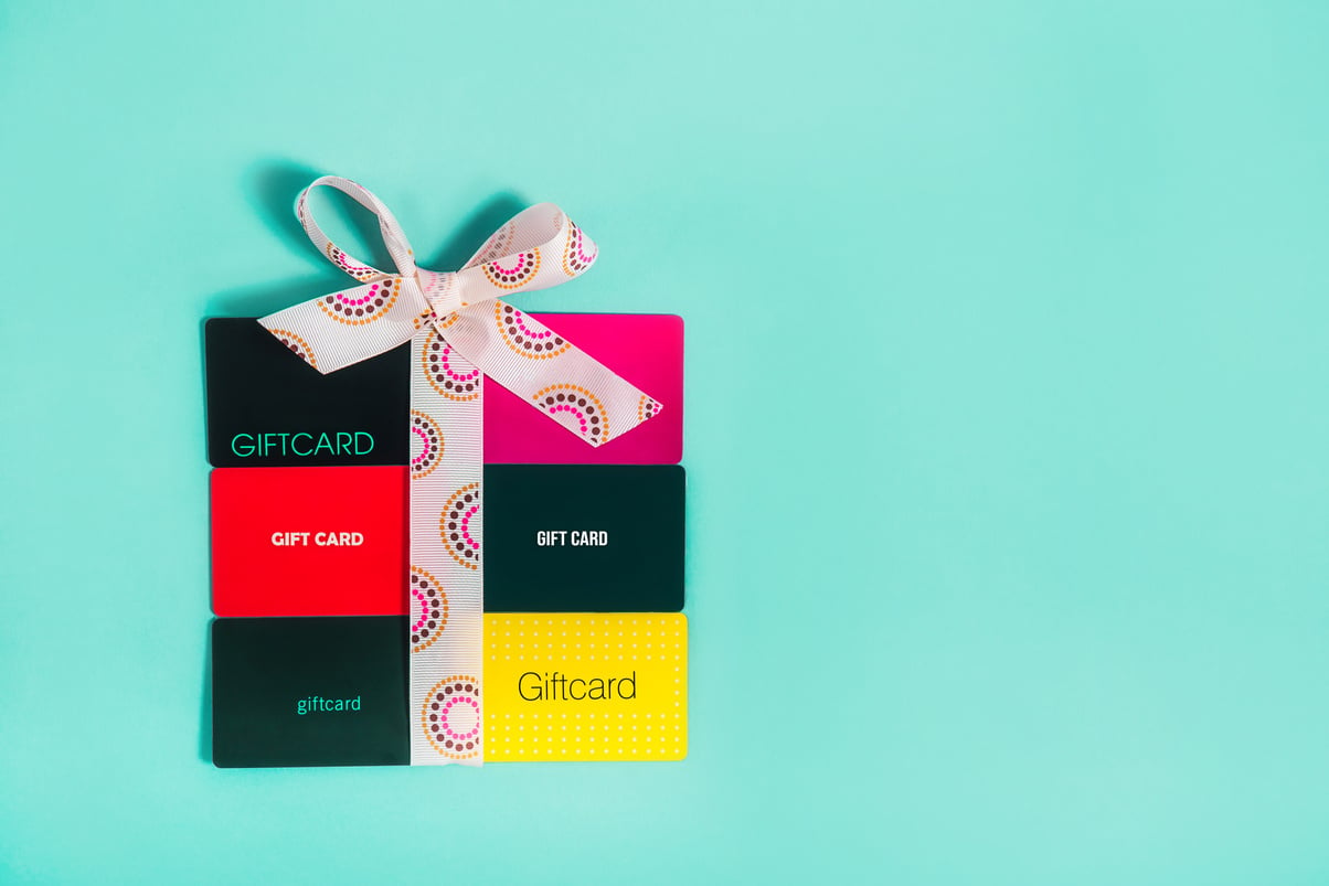 Colorful Gift Cards on Turquoise Background